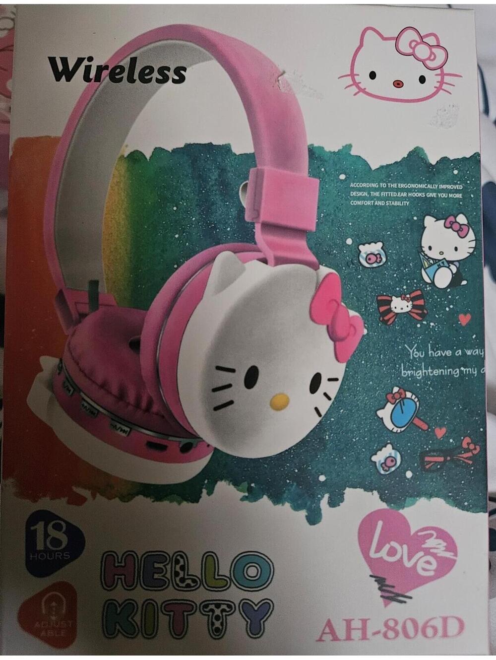 Hello Kitty wireless headphones Hot pink white stereo
